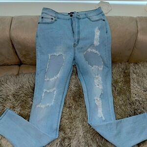 Fashion nova light blue ripped jeans
